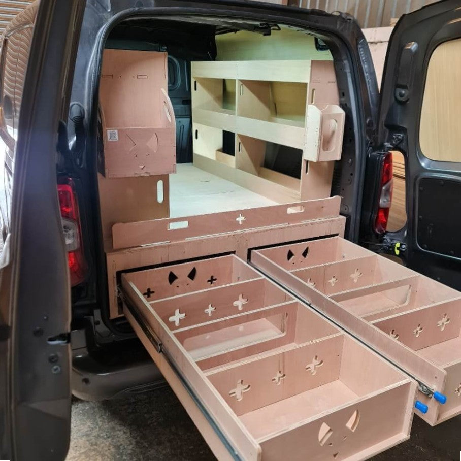 Wooden storage compartments in the back of a Citroen Berlingo