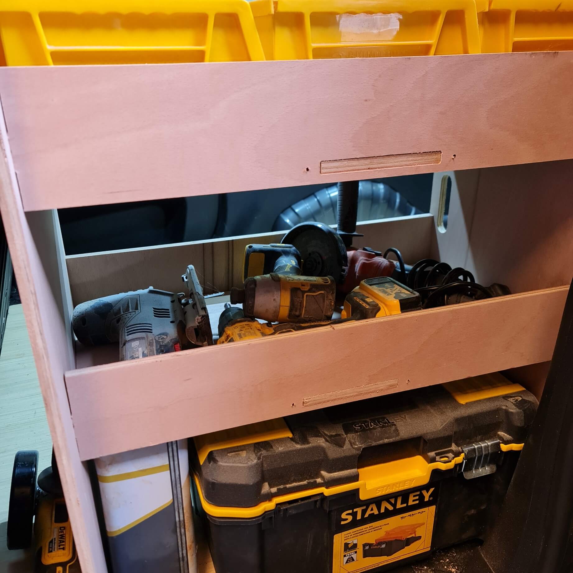 Tool cart with tools and a Stanley toolbox inside