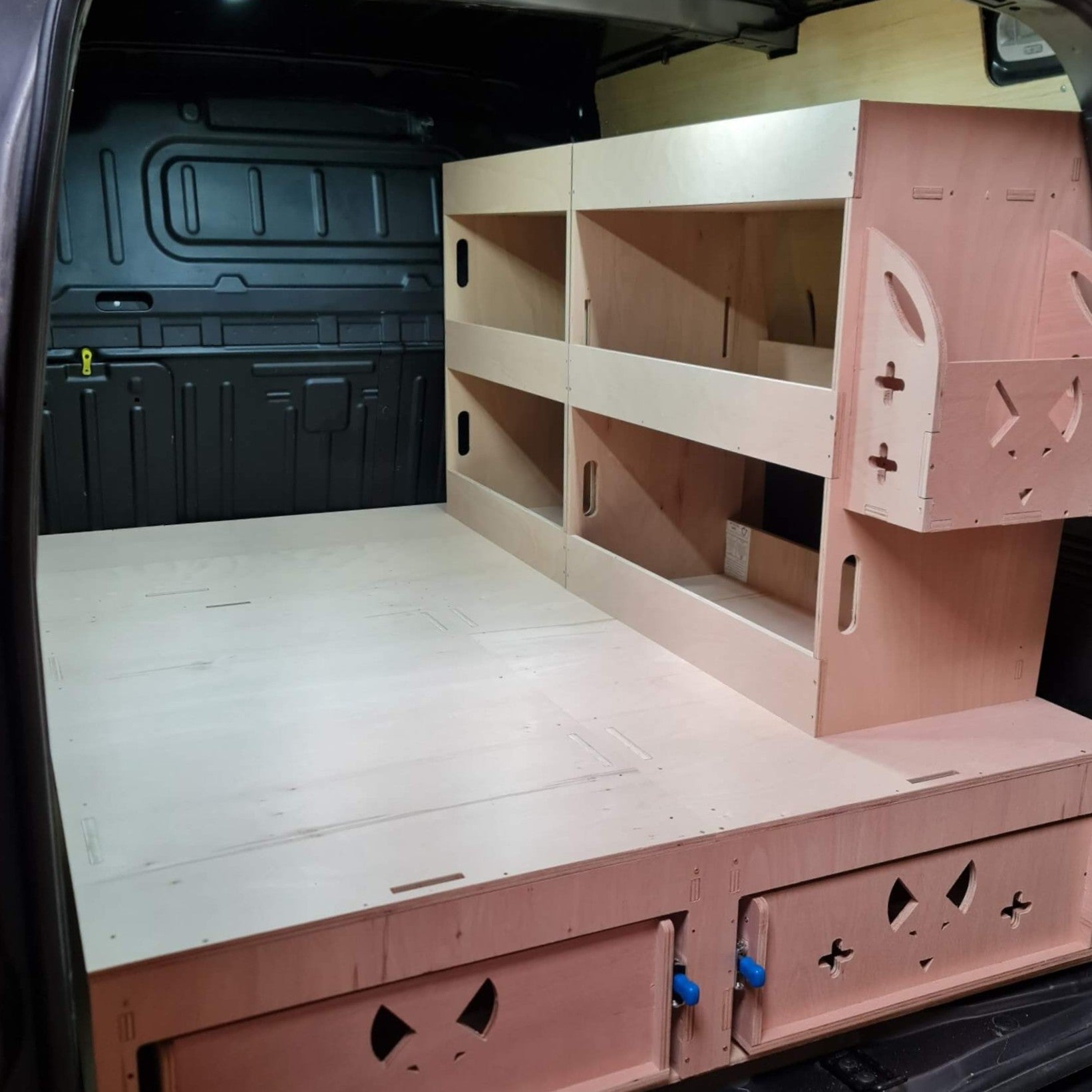 Wooden storage shelves inside a vehicle