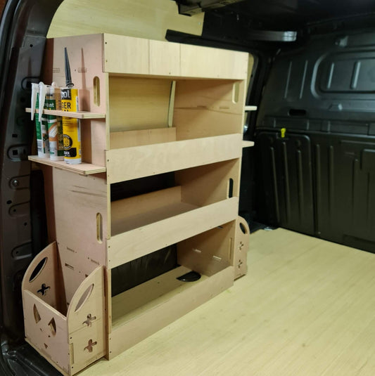 Wooden shelf system inside a vehicle with tools on top