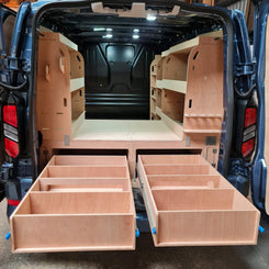 Van interior with wooden storage compartments