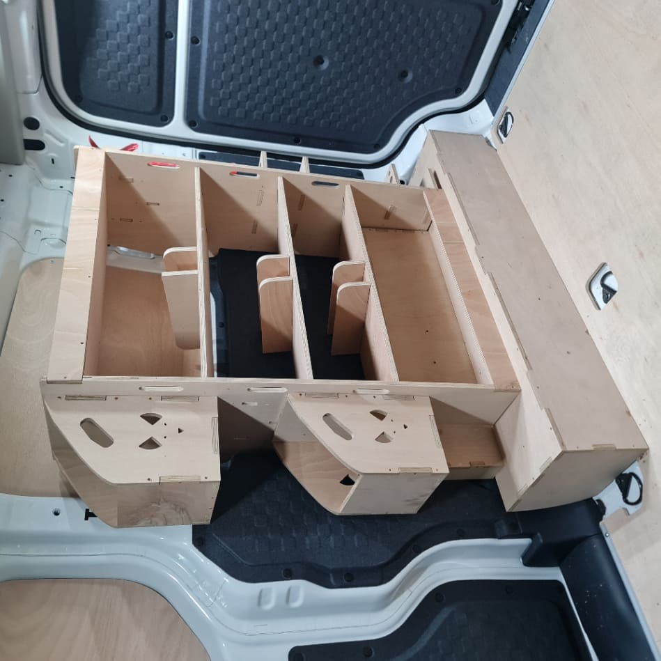 Kia PV5 van racking with tool storage boxes installed