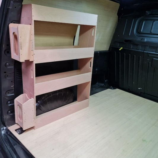 Wooden step ladder in a vehicle's open trunk
