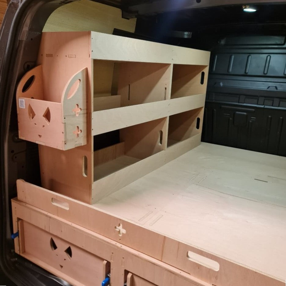 Wooden bunk bed folded out of a vehicle trunk