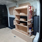 Kia PV5 racking system on raised floor with storage accessories