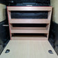 Wooden storage shelves inside a Fiat Doblo with measurements indicated.