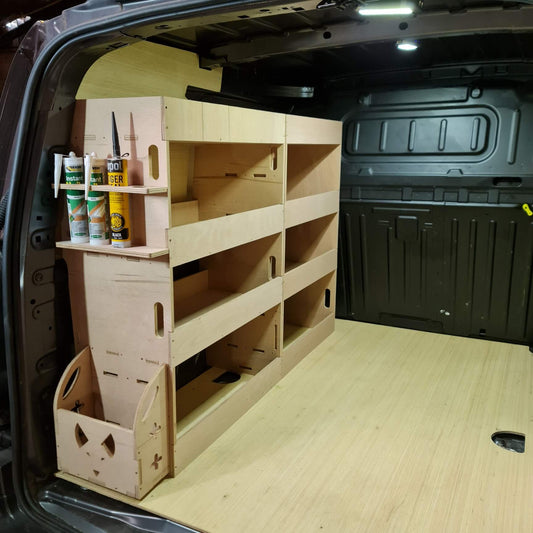 Wooden shelves and storage boxes inside a vehicle's open trunk.