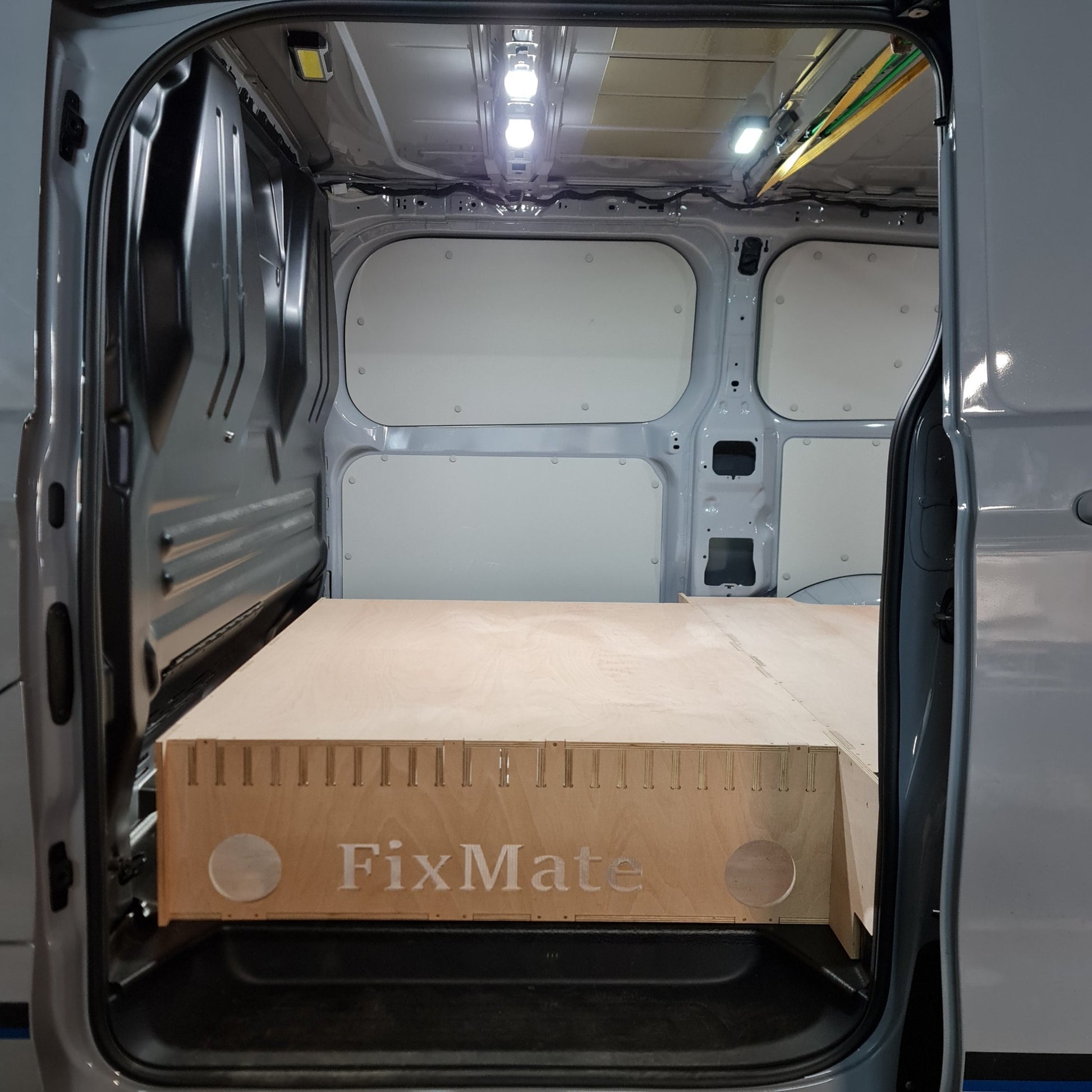 Full sheet access false floor for plasterboard, timber, and plywood in Ford van