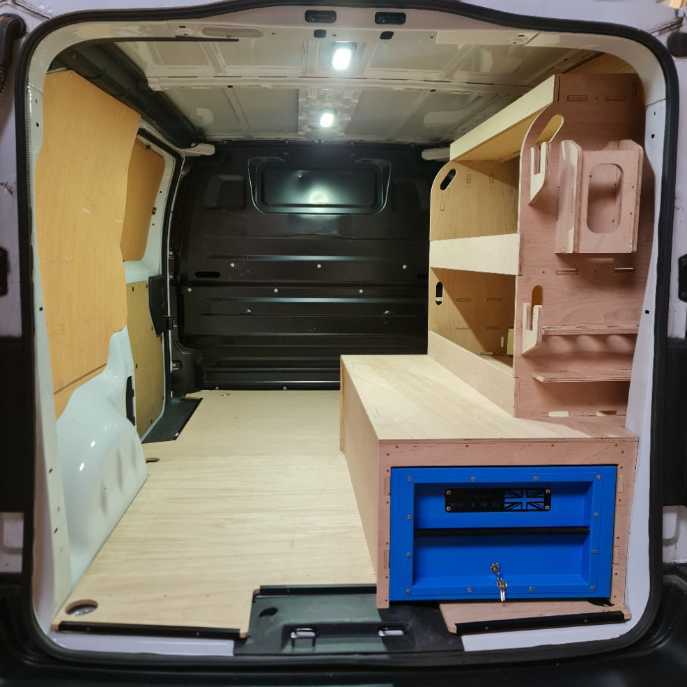 Open storage unit with wooden shelves and a blue vault