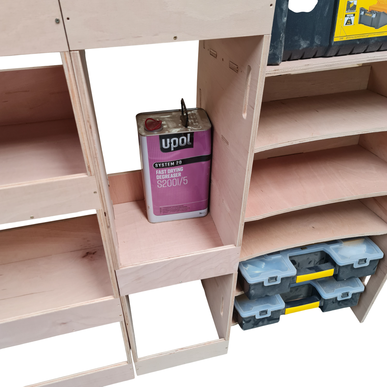 Can of Upol system resin on a wooden shelf with tools in the ID BUZZ