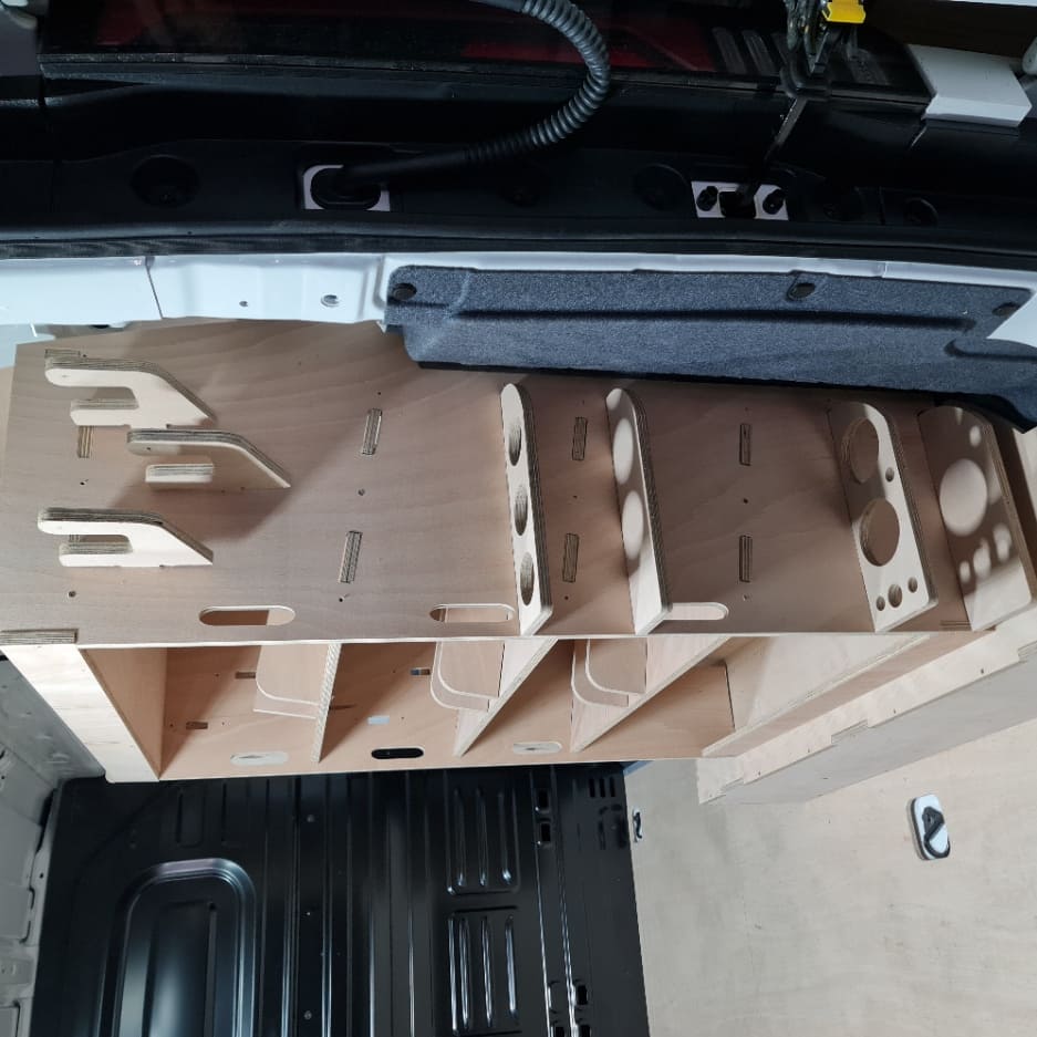 Kia PV5 van storage system with organised tools and accessories