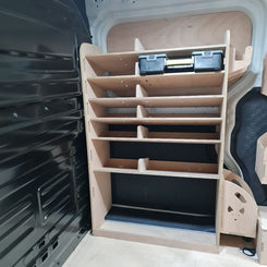 Wooden racking organizer inside a vehicle Kia PV5 trunk