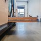 Kia PV5 Van with a Drawer extension in a garage