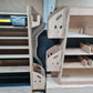 Kia PV5 racking showing compact installation near bulkhead