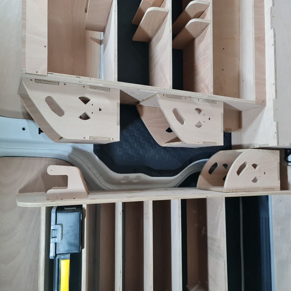 Kia PV5 racking showing compact installation near bulkhead