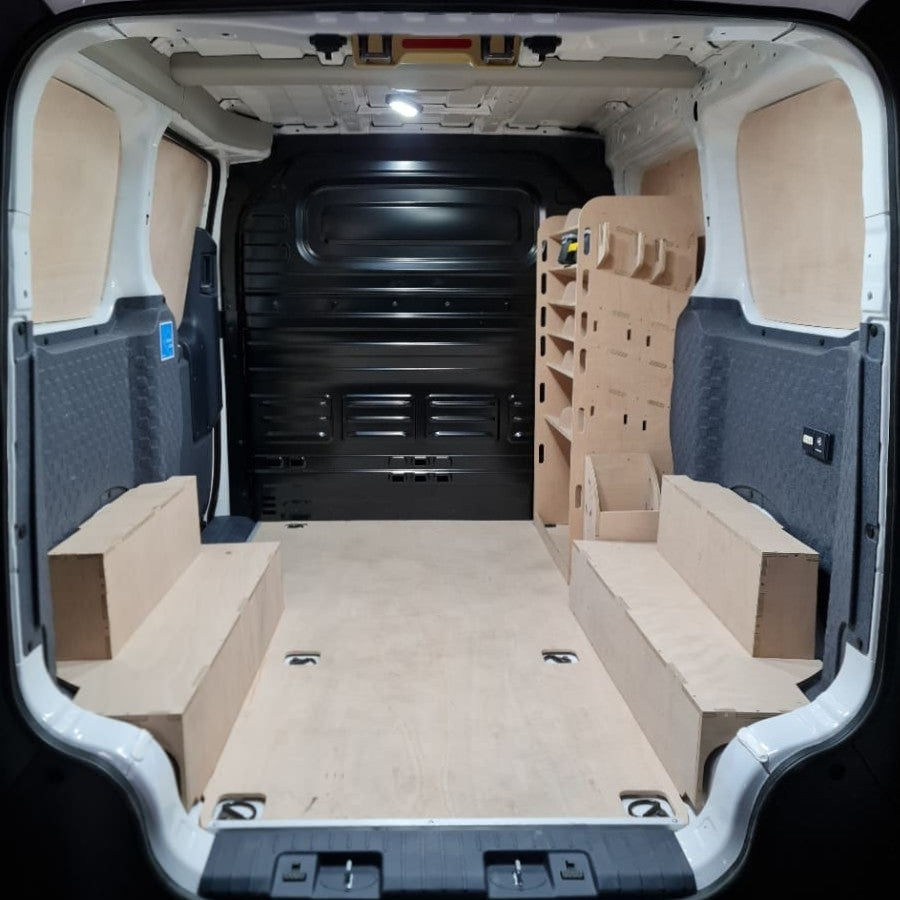 Van interior of Kia PV5 racking system for tool storage