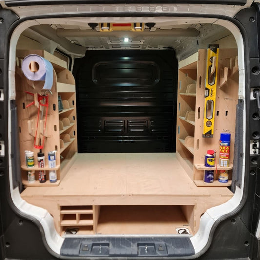 Kia PV5 van racking showing hooks and accessory holders