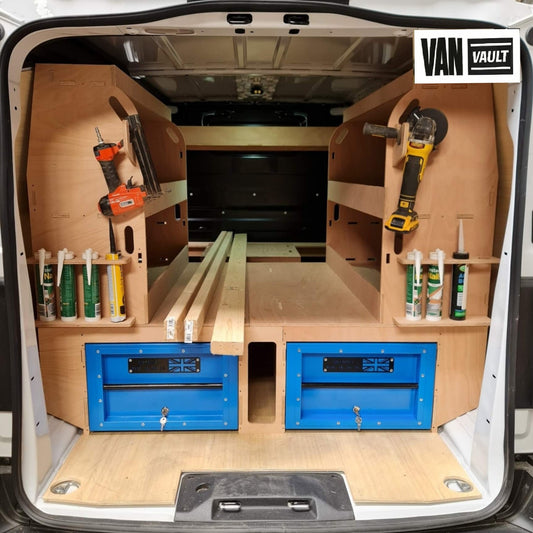 Van interior with organized tools and storage solutions branded 'Van Vault'.