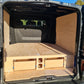 Custom raised floor and racking system inside the cargo area of a Renault Trafic Crew Cab LWB van