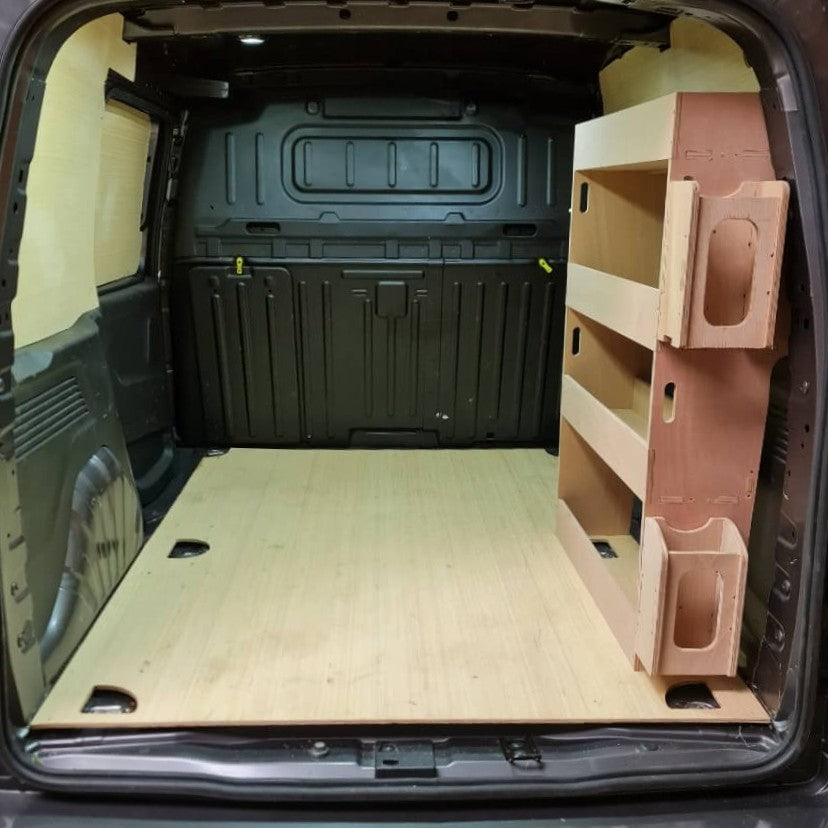 Van interior with wooden floor and shelves