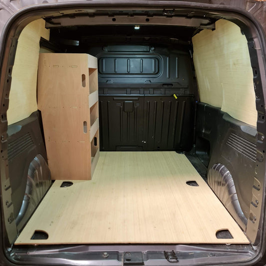 Van interior with wooden floor and shelves