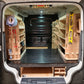 kia-pv5 Van interior with organized shelves and tools