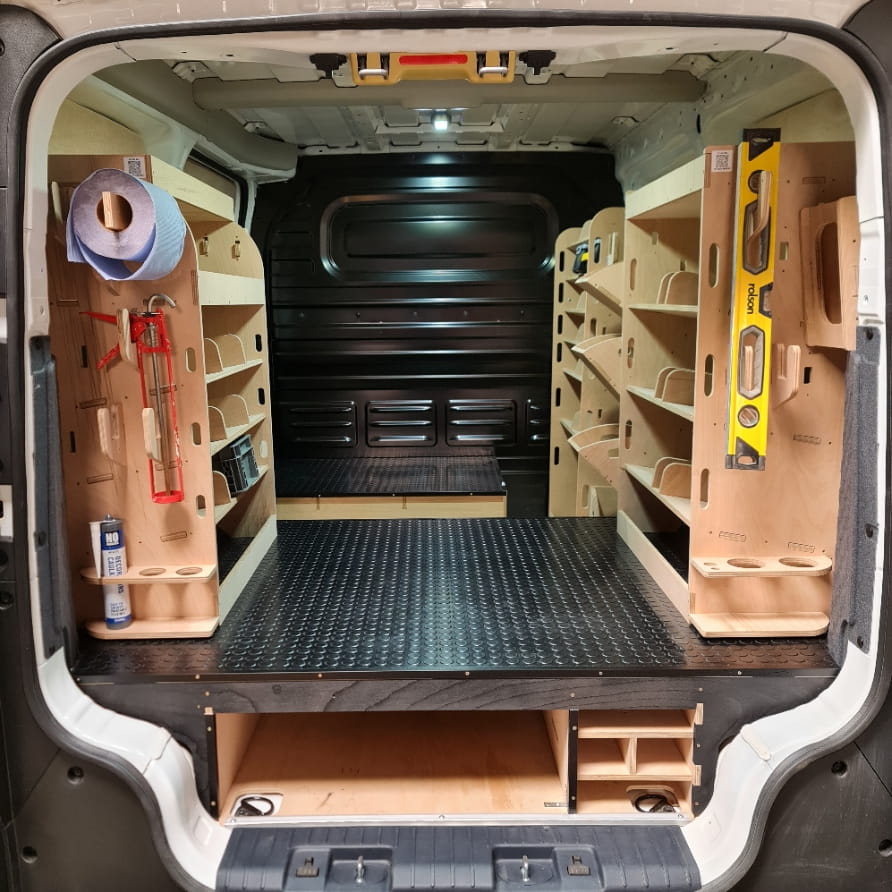 kia-pv5 Van interior with organized shelves and tools