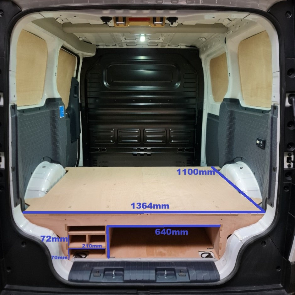 Custom Kia PV5 van racking system with raised floor and storage compartments