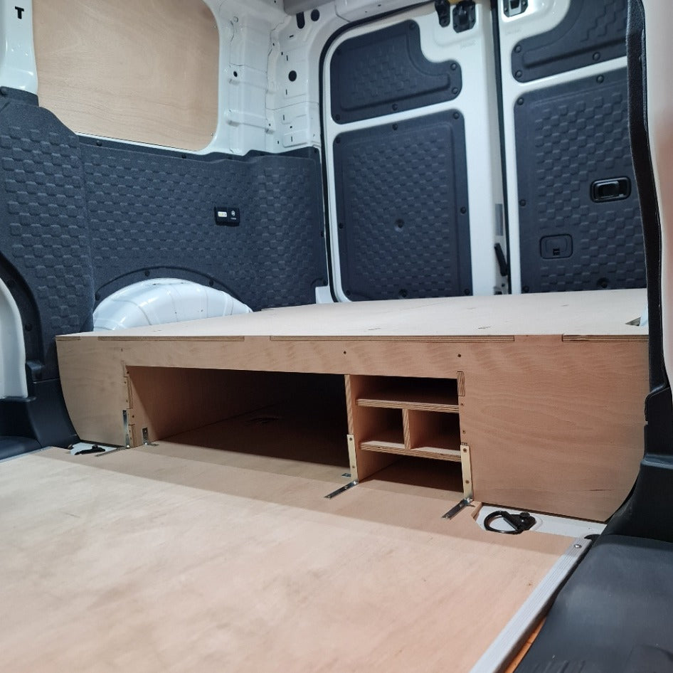 Kia PV5 van interior with side racking and pull-out drawer system
