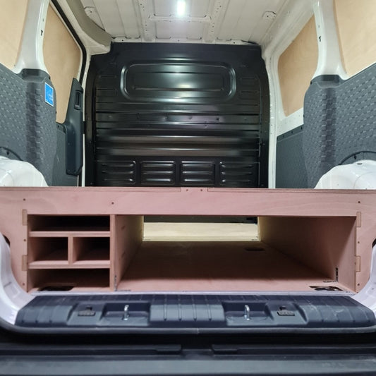 Professional racking installation in Kia PV5 van with shelves and rear access
