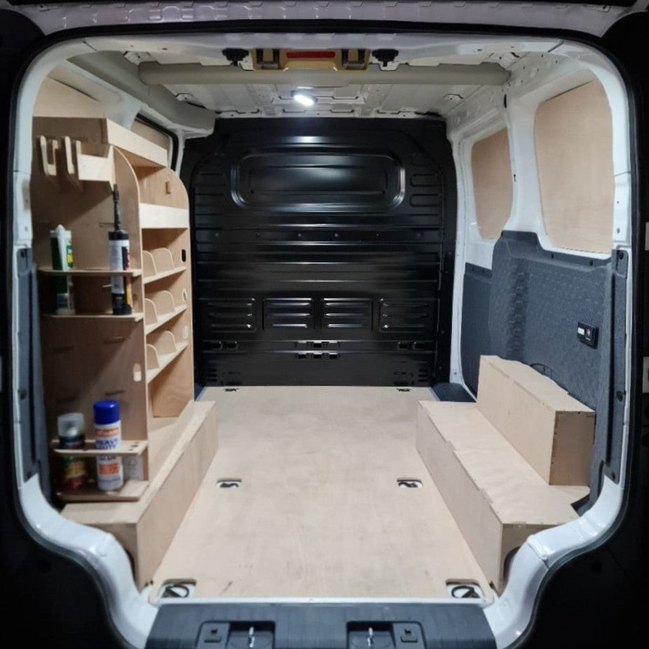 Custom Kia PV5 racking system for raised floor with storage boxes and holders. Durable, lightweight and easy to install