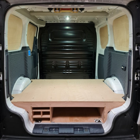 Kia PV5 shelving setup with tool storage and organiser boxes inside van