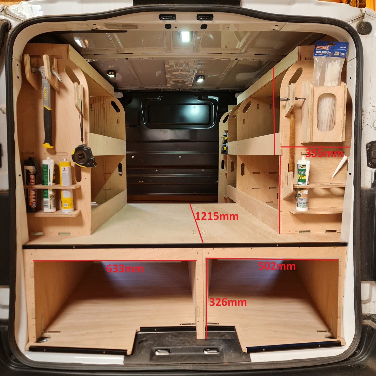 Wooden storage shelves inside a vehicle toyota proace with measurements indicated