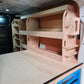 Under‑floor storage space beneath raised false floor in Toyota Proace MWB
