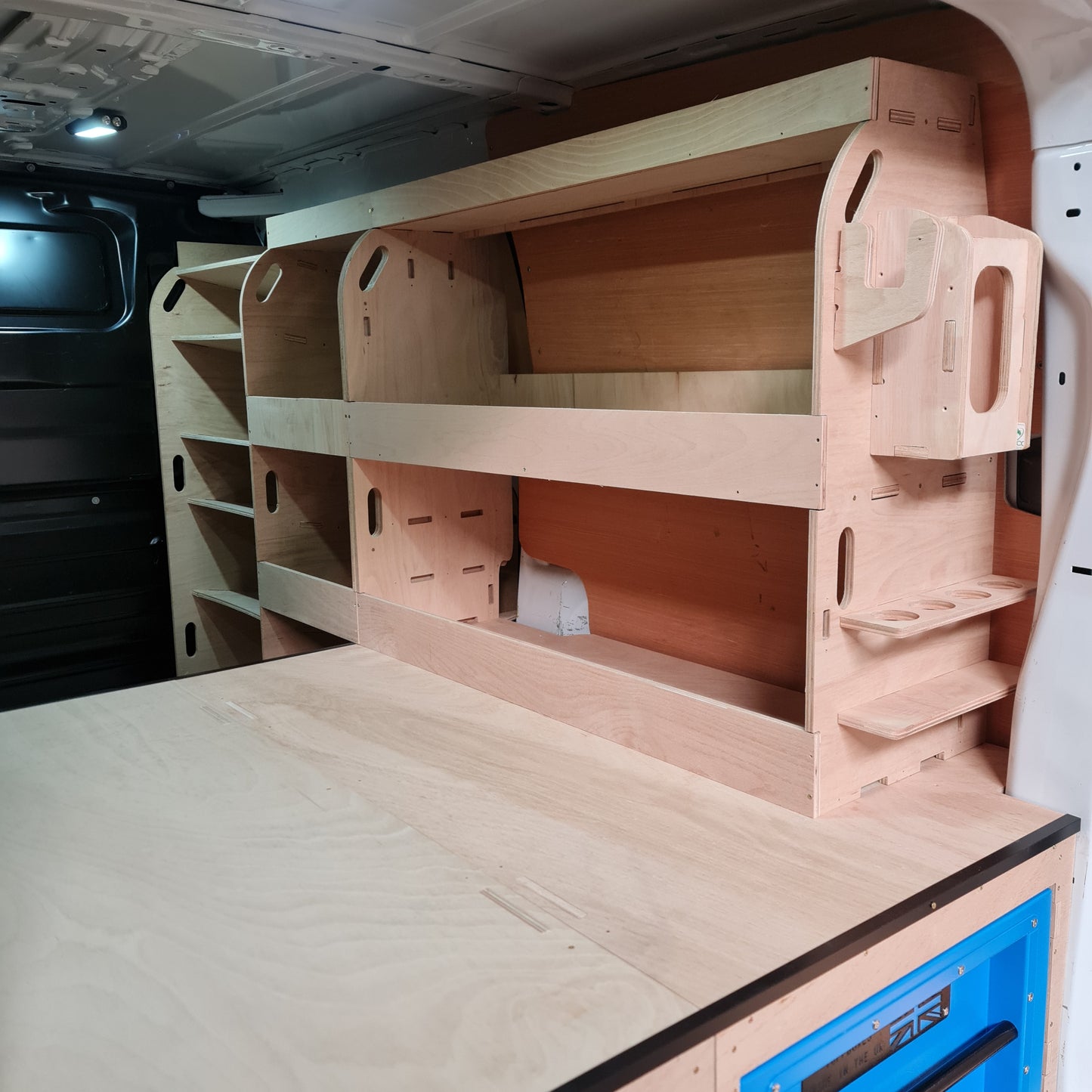 Under‑floor storage space beneath raised false floor in Toyota Proace MWB