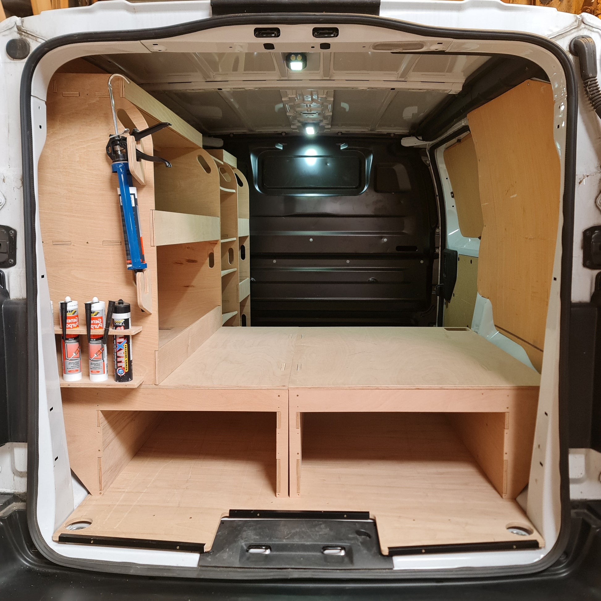 Toyota Proace van false floor with driver side racking set for tools, equipment, ladders, pipes and everyday work essentials