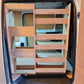Vauxhall Vivaro underfloor storage with Euro box racking for tools and trade equipment