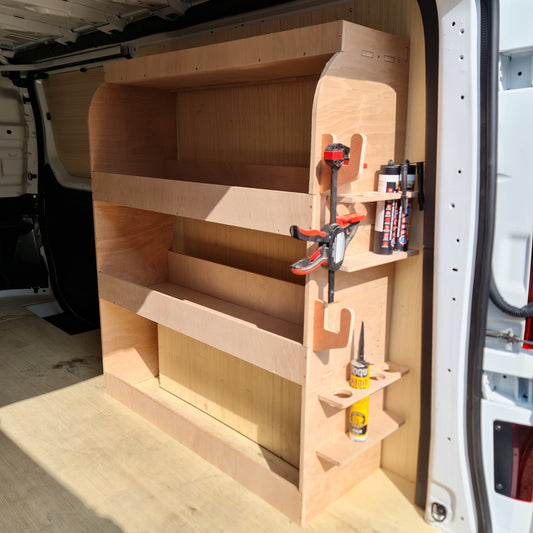 Wooden shelf system inside a vehicle vauxhall vivaro with tools and supplies