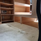 Driver side racking with tool and drill storage compartments for organised equipment access