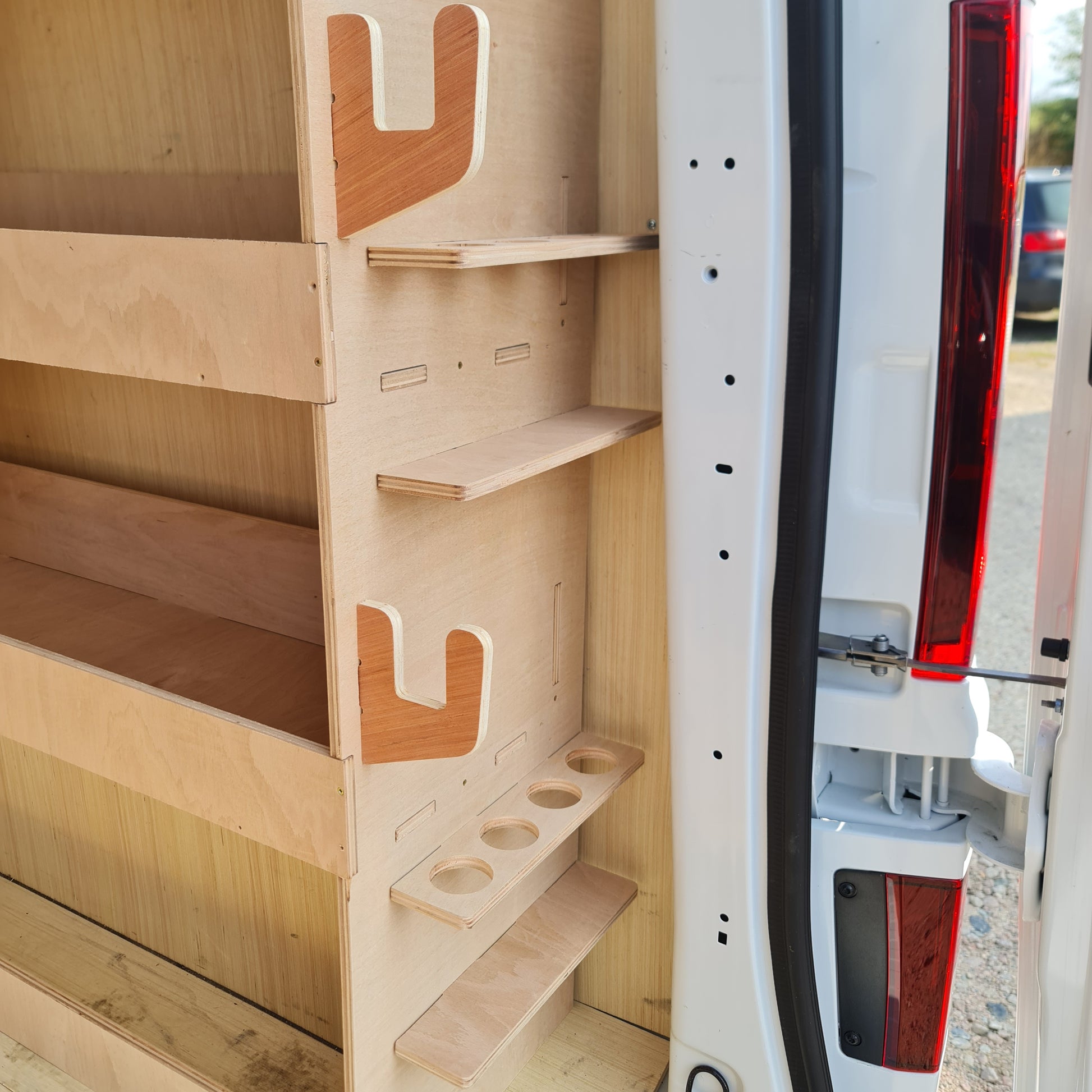 Tool and drill storage compartments designed for easy access and organisation.
