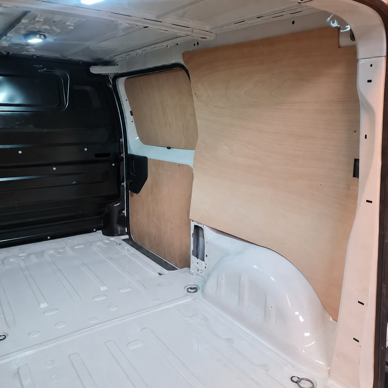 Vauxhall Vivaro wheel arch side plywood panels for ply lining kit