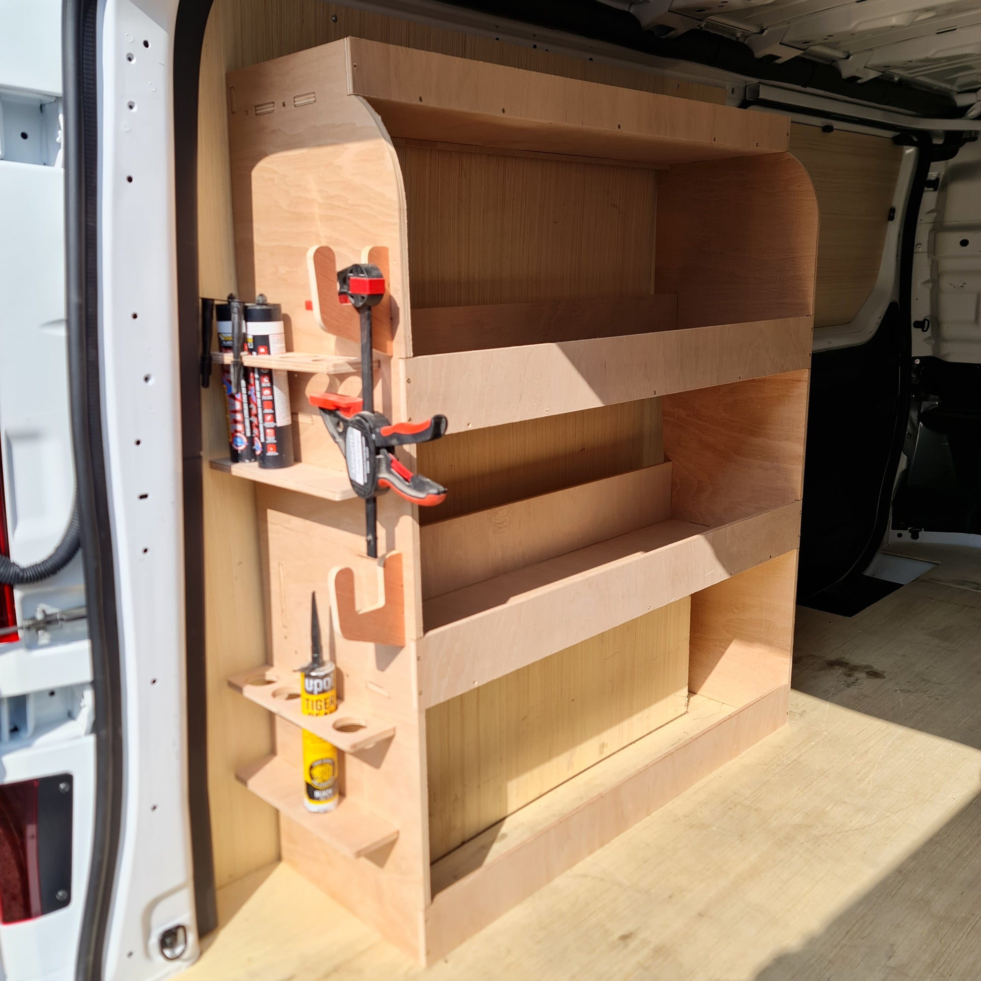 Close-up of tool storage shelving compartments for organised equipment storage